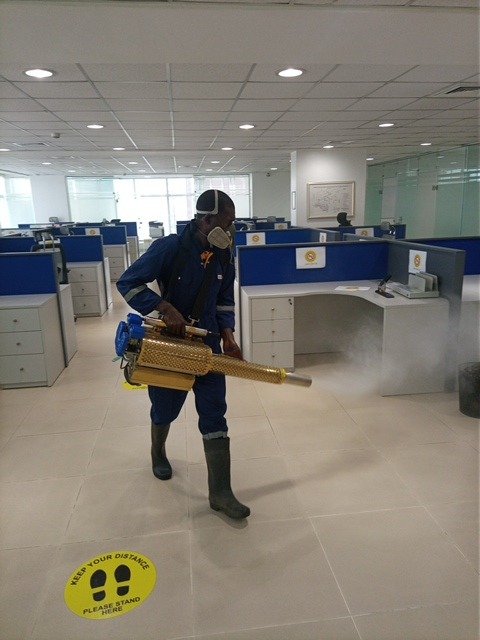 Pest control fumigation in progress at commercial facility in Abuja