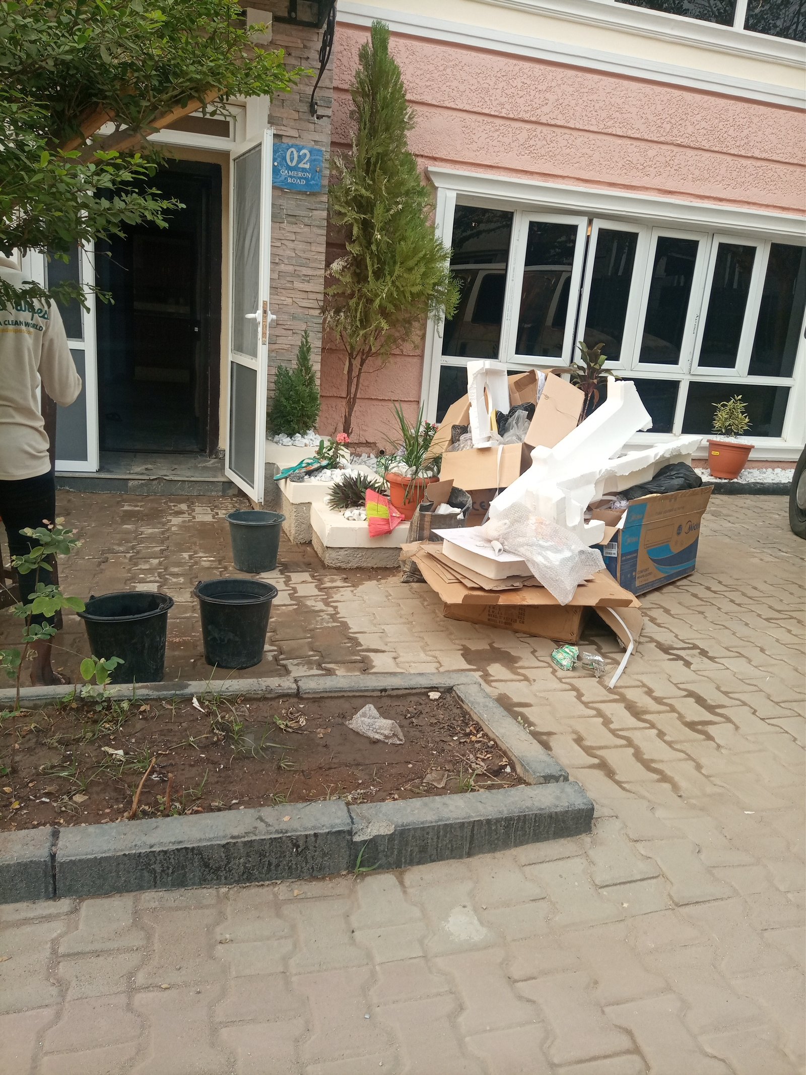 Post-construction waste removal from residential property exterior in Abuja